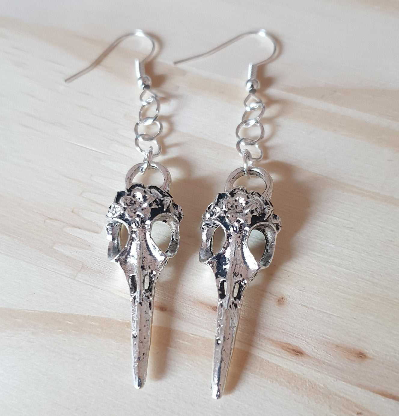 Boucle d'oreille skull-crow